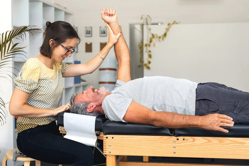 senior-man-having-chiropractic-adjustment-2021-08-29-09-30-51-utc